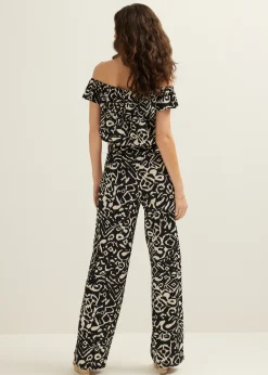Outlet Cotton Club Off-shoulder top met tweekleurige print zwart